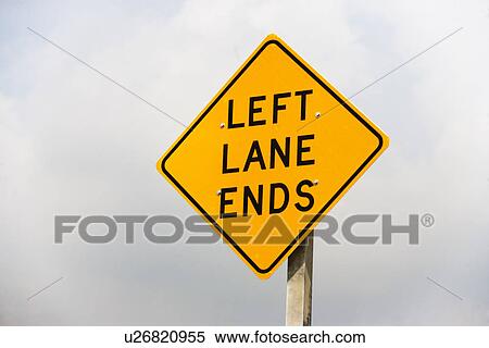 Left Lane Ends street sign View Large Photo Image Stock Photography - Left Lane Ends street sign. Fotosearch