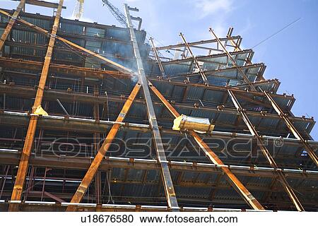 Low angle view of construction site View Large Photo Image Stock Image - Low angle view of construction site. Fotosearch