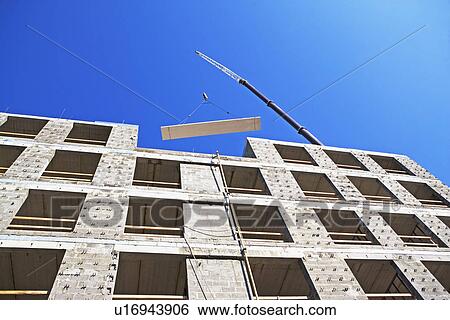 Stock Photograph - Low angle view of construction site. Fotosearch