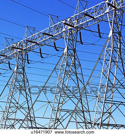 Low angle view of electrical poles View Large Photo Image Stock Photo - Low angle view of electrical poles. Fotosearch