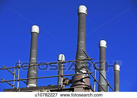 Low angle view of high voltage station View Large Photo Image Stock Photo - Low angle view of high voltage station. Fotosearch