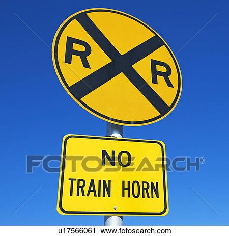 Low angle view of Railroad crossing sign View Large Photo Image Stock Image - Low angle view of Railroad crossing sign. Fotosearch
