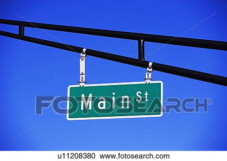 Main Street sign under blue sky View Large Photo Image Stock Image - Main Street sign under blue sky. Fotosearch