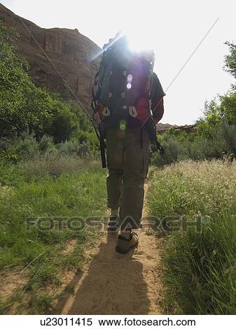 Man hiking in desert View Large Photo Image Stock Photography - Man hiking in desert. Fotosearch