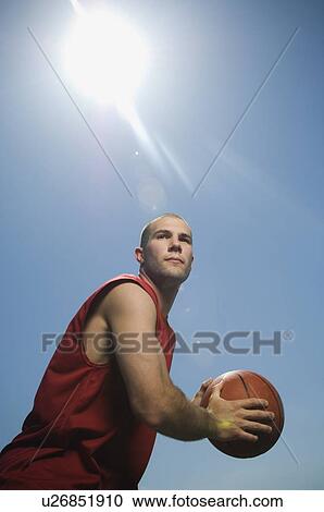 Man playing basketball View Large Photo Image Stock Image - Man playing basketball. Fotosearch