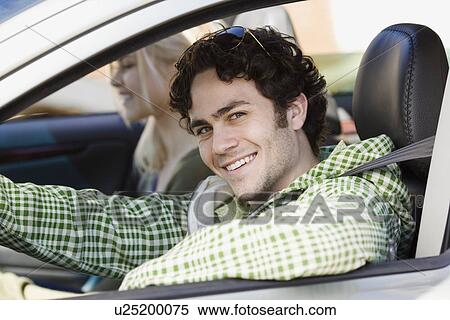 Man sitting in driver’s side of car View Large Photo Image Stock Photography - Man sitting in driver’s side of car. Fotosearch