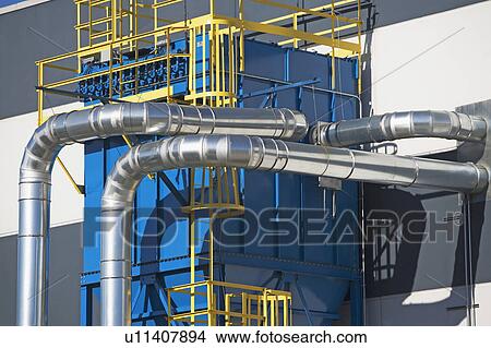 Metal ducts on outside of building View Large Photo Image Picture - Metal ducts on outside of building. Fotosearch