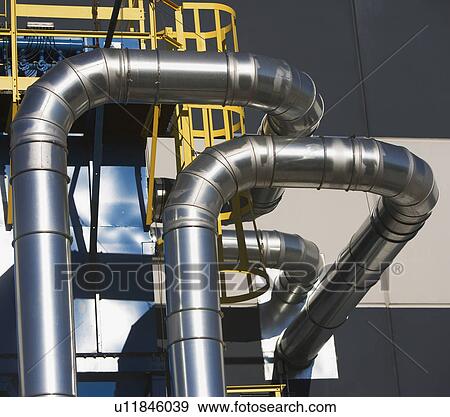 Stock Photo - Metal ducts on outside of building. Fotosearch