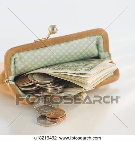 Stock Image - Money in open change purse. Fotosearch
