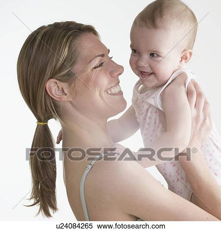 Stock Photography - Mother with baby. Fotosearch