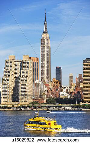 New York City skyline along water View Large Photo Image Stock Image - New York City skyline along water. Fotosearch