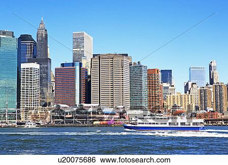 New York City skyline along water View Large Photo Image Stock Photograph - New York City skyline along water. Fotosearch