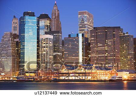 New York City skyline at dusk View Large Photo Image Stock Photo - New York City skyline at dusk. Fotosearch