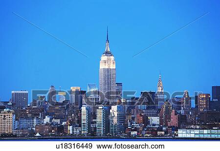 New York City skyline at night View Large Photo Image Stock Photo - New York City skyline at night. Fotosearch
