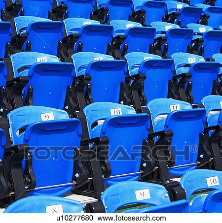 Stock Image - Numbered arena seating. Fotosearch