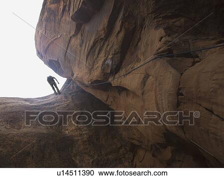 Person canyon rappelling View Large Photo Image Stock Image - Person canyon rappelling. Fotosearch