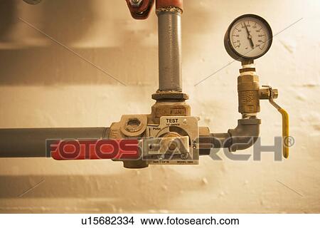Pipes with pressure gauge and shutoff valve View Large Photo Image Picture - Pipes with pressure gauge and shutoff valve. Fotosearch