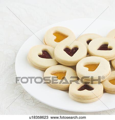 Plate of heart shaped cookies View Large Photo Image Stock Image - Plate of heart shaped cookies. Fotosearch