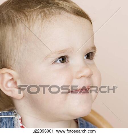 Stock Image - Portrait of female toddler. Fotosearch