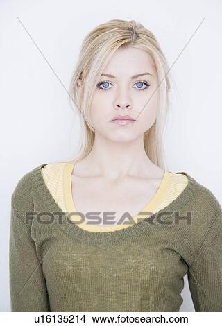 Portrait of woman wearing sweater View Large Photo Image Picture - Portrait of woman wearing sweater. Fotosearch