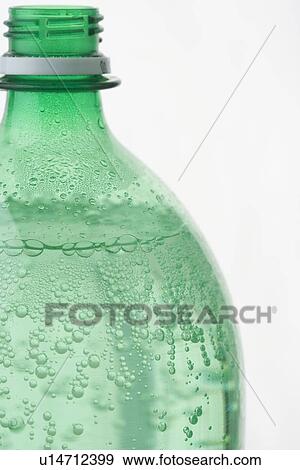 Profile of green plastic soda bottle View Large Photo Image Stock Photo - Profile of green plastic soda bottle. Fotosearch