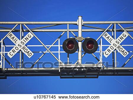 Stock Photography - Railroad crossing sign and lights. Fotosearch