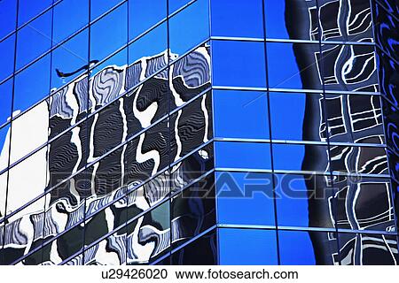 Stock Image - Reflections in high rise windows. Fotosearch