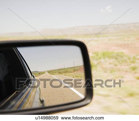 Road reflected in car side mirror View Large Photo Image Stock Photo - Road reflected in car side mirror. Fotosearch