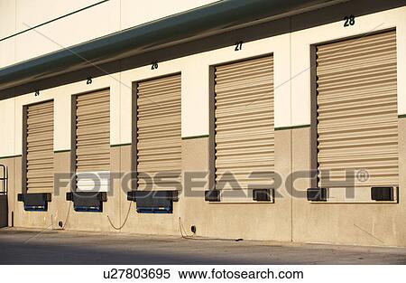 Row of closed loading docks View Large Photo Image Stock Photography - Row of closed loading docks. Fotosearch