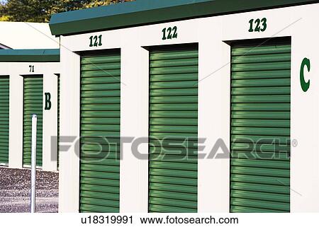Stock Image - Row of outdoor self storage units. Fotosearch