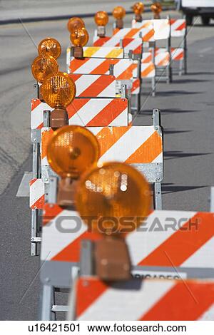 Row of traffic barricades with lights View Large Photo Image Stock Image - Row of traffic barricades with lights. Fotosearch
