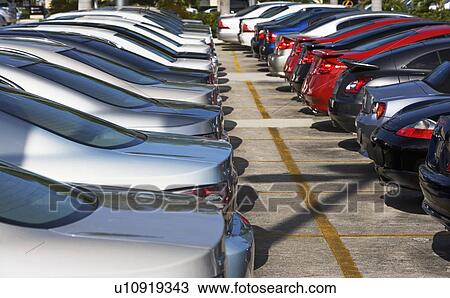 Rows of new cars on lot View Large Photo Image Stock Image - Rows of new cars on lot. Fotosearch