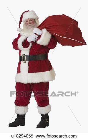 Santa Claus holding bag of toys View Large Photo Image Stock Photography - Santa Claus holding bag of toys. Fotosearch