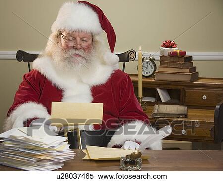 Santa Claus reading mail View Large Photo Image Stock Photography - Santa Claus reading mail. Fotosearch