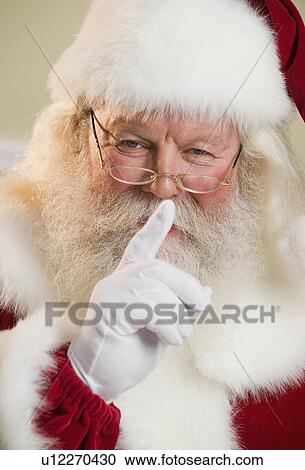Santa Claus shushing View Large Photo Image Stock Image - Santa Claus shushing. Fotosearch