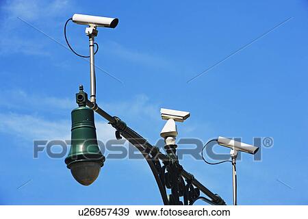 Security cameras on lamp post View Large Photo Image Stock Photo - Security cameras on lamp post. Fotosearch