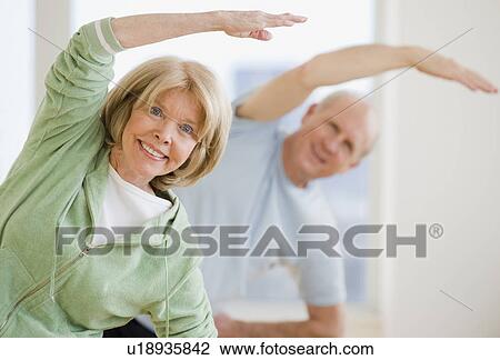 Senior couple exercising View Large Photo Image Stock Image - Senior couple exercising. Fotosearch