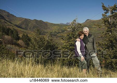 Senior couple hugging outdoors, Utah, United States View Large Photo Image Stock Photo - Senior couple hugging outdoors, Utah, United States. Fotosearch