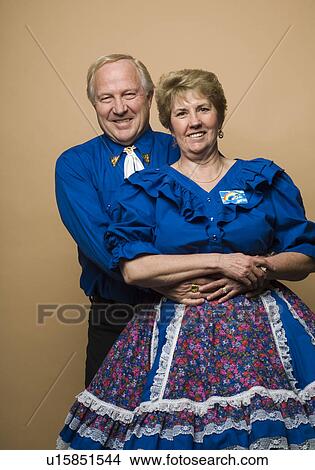 Picture - Senior couple in square dancing outfits. Fotosearch