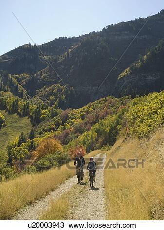 Senior couple riding mountain bikes, Utah, United States View Large Photo Image Stock Image - Senior couple riding mountain bikes, Utah, United States. Fotosearch