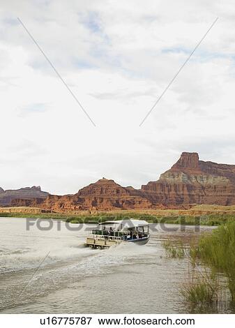 Stock Photo - Sightseeing boat on river. Fotosearch