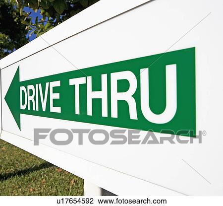Sign pointing towards Drive Thru View Large Photo Image Stock Image - Sign pointing towards Drive Thru. Fotosearch