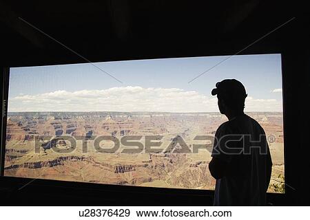Silhouette of man on boxcar View Large Photo Image Stock Photo - Silhouette of man on boxcar. Fotosearch