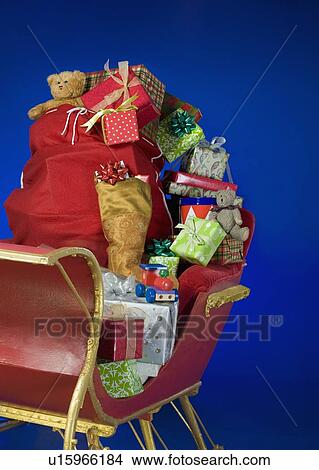 Picture - Sleigh with bag of Christmas toys. Fotosearch