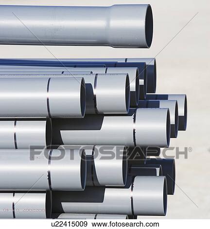 Stack of large metal pipes View Large Photo Image Stock Photo - Stack of large metal pipes. Fotosearch