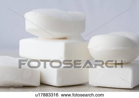 Stacks of white bars of soap View Large Photo Image Stock Photograph - Stacks of white bars of soap. Fotosearch
