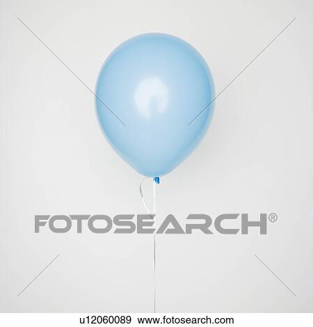 Still life of a blue balloon View Large Photo Image Stock Photo - Still life of a blue balloon. Fotosearch