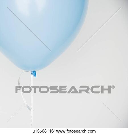 Stock Photograph - Still life of a blue balloon. Fotosearch