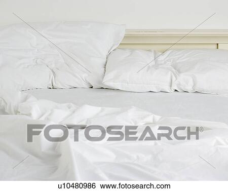 Still life of an unmade bed View Large Photo Image Stock Photograph - Still life of an unmade bed. Fotosearch