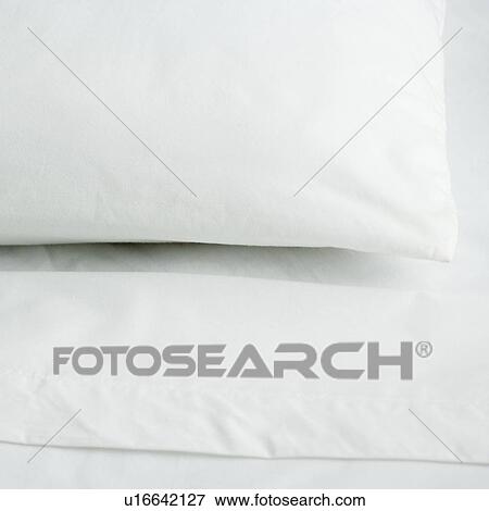 Still life of pillow and bed sheets View Large Photo Image Stock Photo - Still life of pillow and bed sheets. Fotosearch